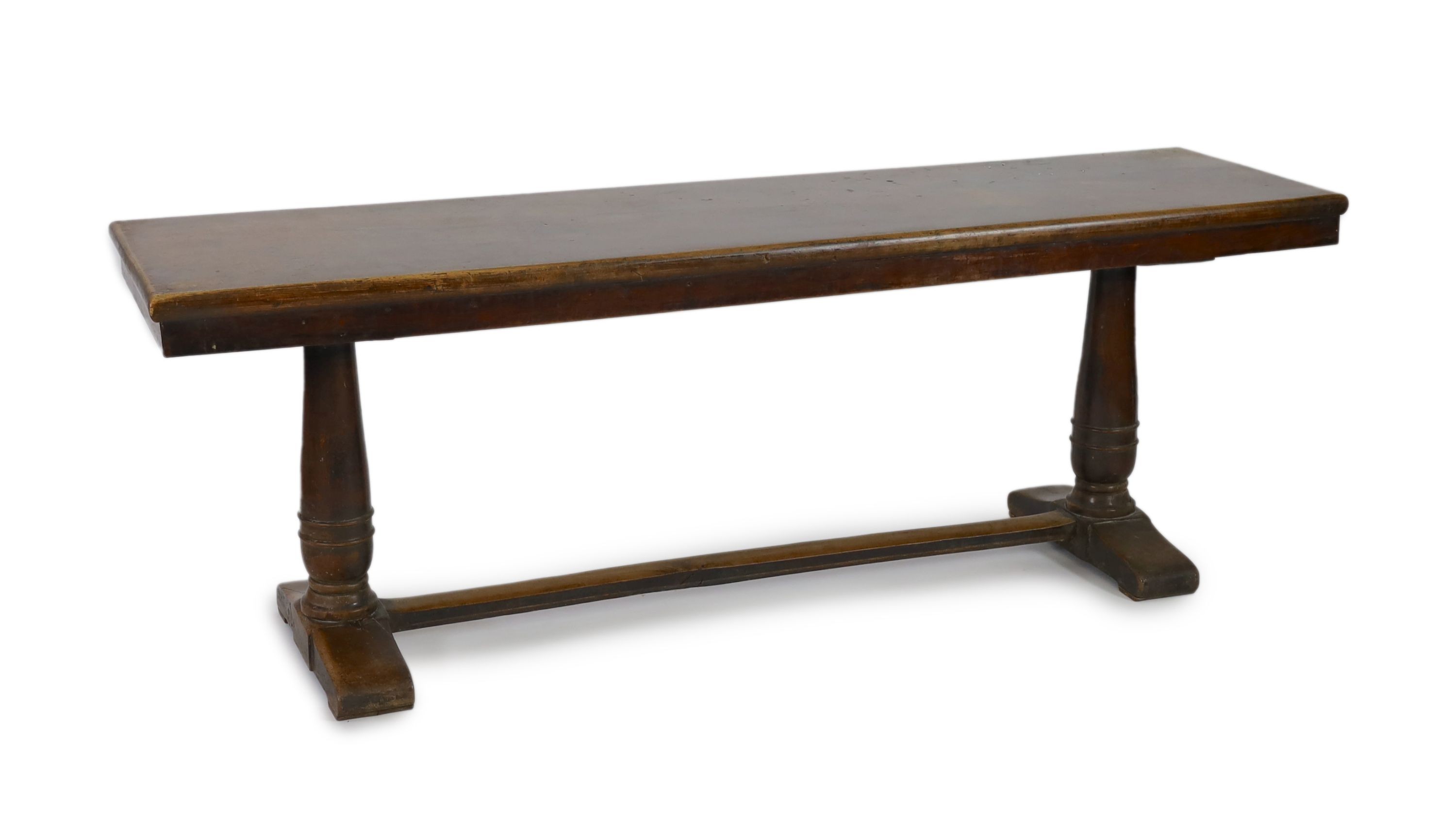 An 18th century walnut refectory table, W.232cm D.59cm H.82cm